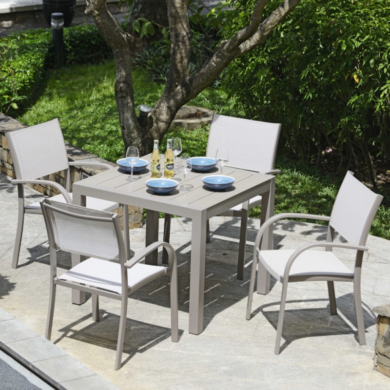 Milan dining table and 4 stacking chairs